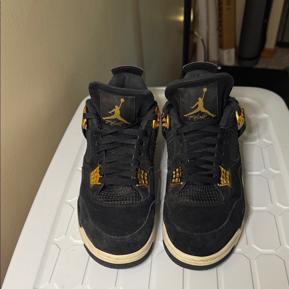 Jordan 4s Royalty Retro  Sneakers in Black and Gold